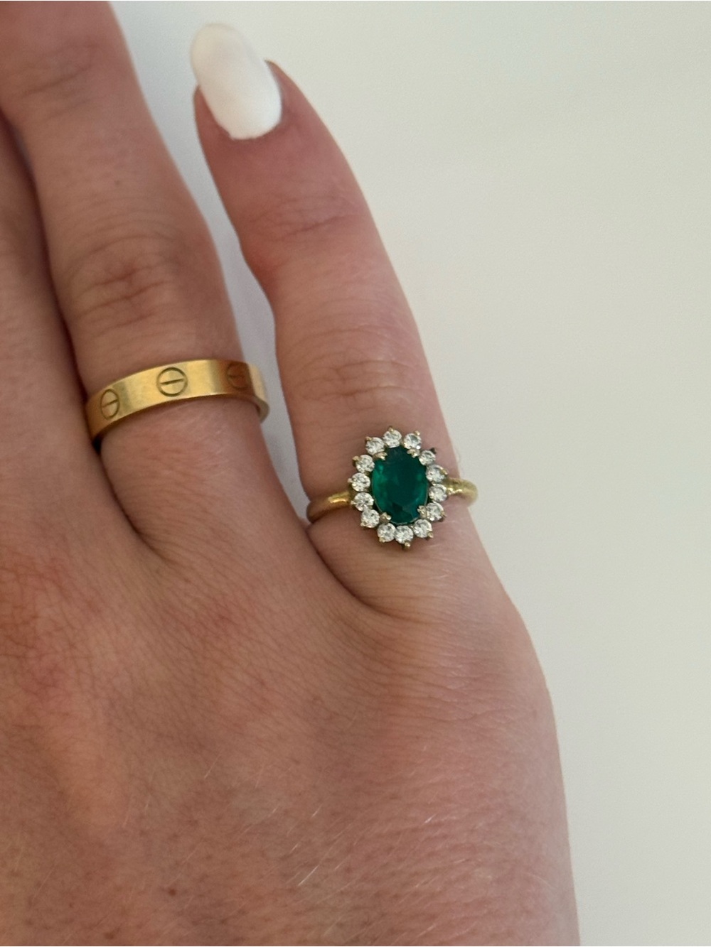 Gold Pinky Ring with Emerald Green Center and Diamond Halo